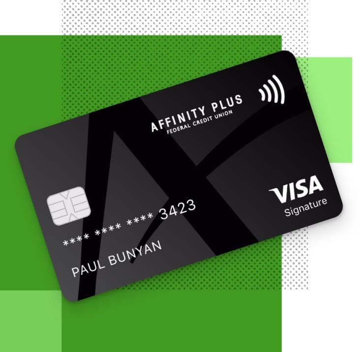 Black Affinity Plus credit card on a green background