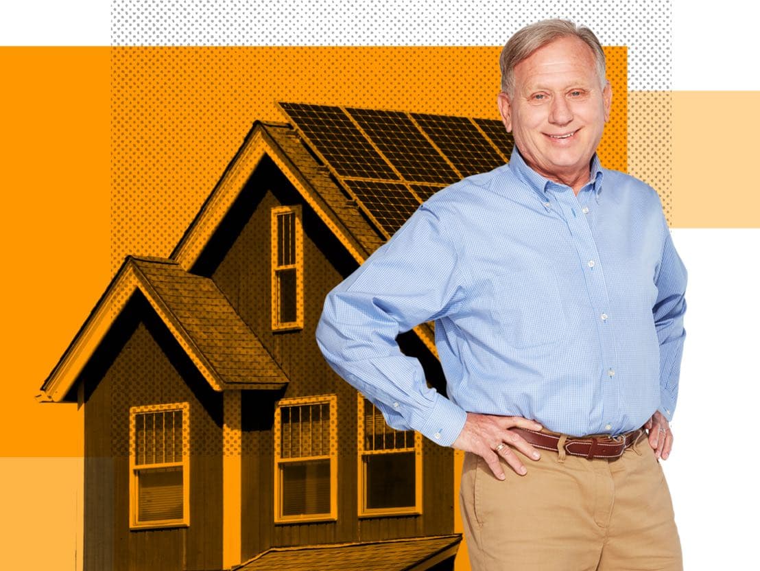 Joe, an Affinity Plus member, in front of a home with solar panels.