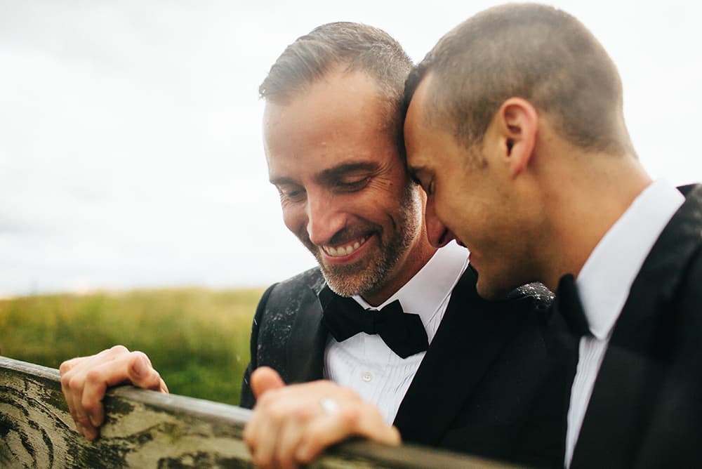 Couple in tuxes at wedding
