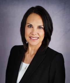 a headshot of Jenny Neubeck, VP of Remote Services