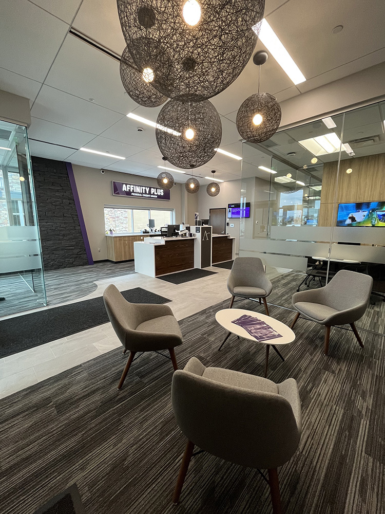 inside lobby with table and chairs at the Lake Elmo branch