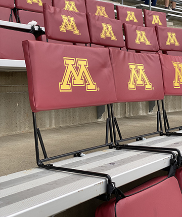 Stadium seats with the Gopher M logo
