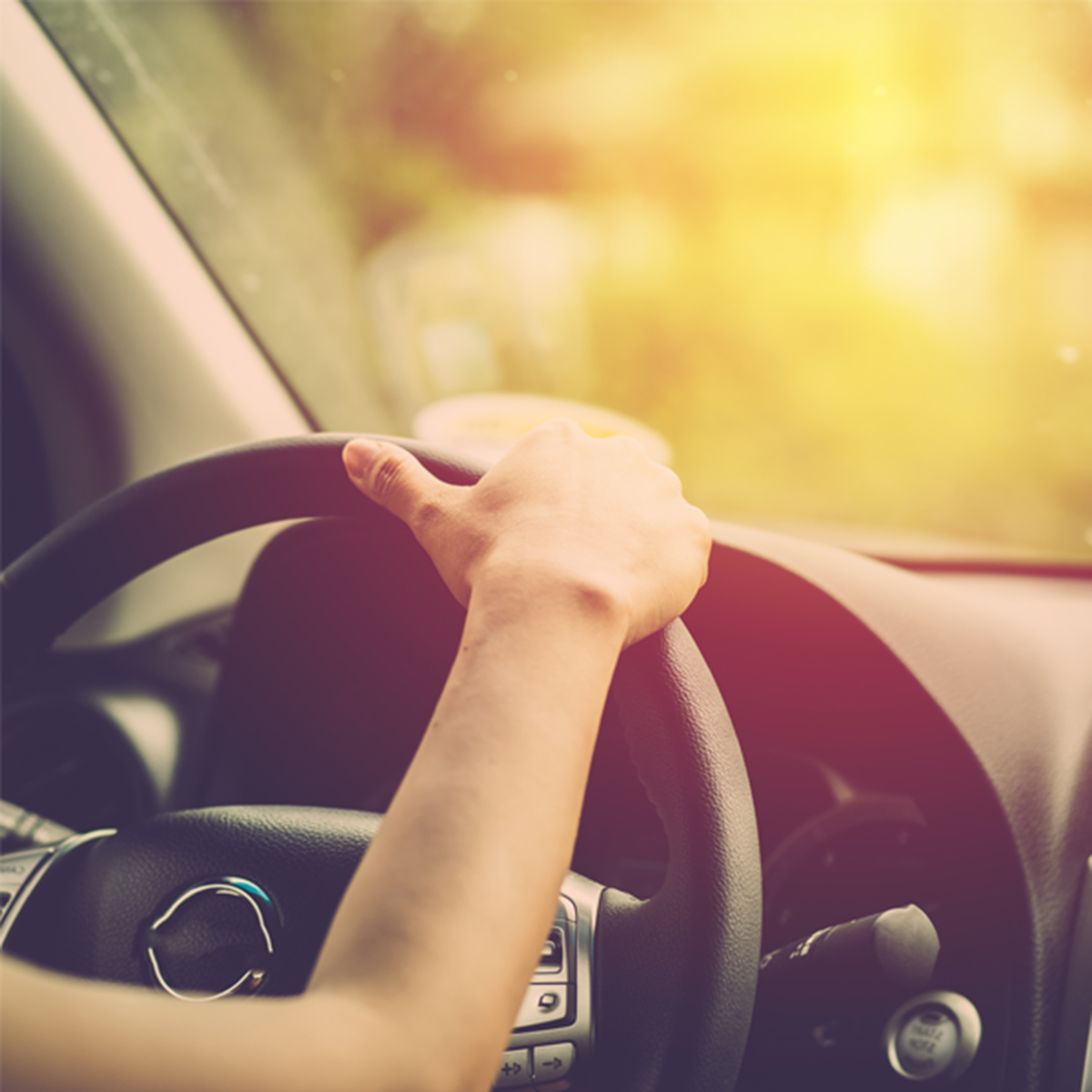 Woman behind the wheel of a car