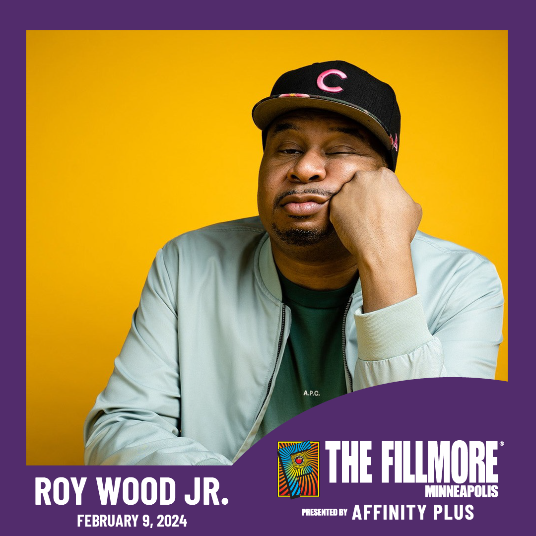 A head shot of comedian, Roy Wood Jr against a yellow background